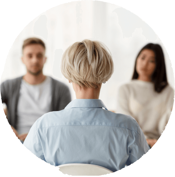 Woman talking to two clients